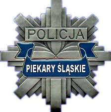 Odznaka policyjna, na której widnieje napis "Piekary Śląskie"