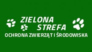 Biały napis &quot;Zielona strefa ochrona zwierząt i środowiska&quot; na zielonym tle