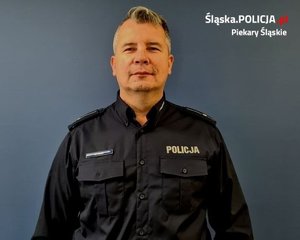 młodszy aspirant Adam Paliga- dzielnicowy rejonu służbowego 07