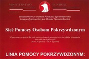 Plakat informujący o projekcie &quot;sieć pomocy osobom pokrzywdzonym&quot;