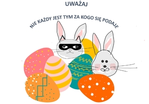 Grafika przedstawia pisanki oraz dwa króliki, z czego jeden ma założoną na oczach czarną opaskę