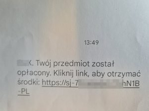 Zdjęcie przedstawia wiadomość sms z prośbą o kliknięcie w przesłany link