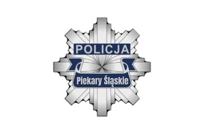 Zdjęcie przedstawia odznakę Policji