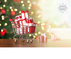 Grafika przedstawia wózek zakupowy ze świątecznymi zakupami