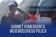 Zdjęcie policjanta na tle Komendy Wojewódzkiej Policji w Katowicach